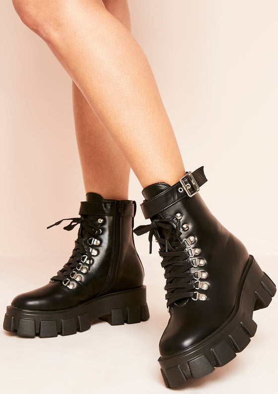 black lace up extreme cleated sole hiker boots