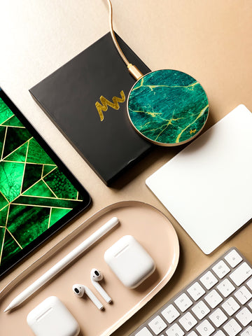 qi charger on desk next to pen tray