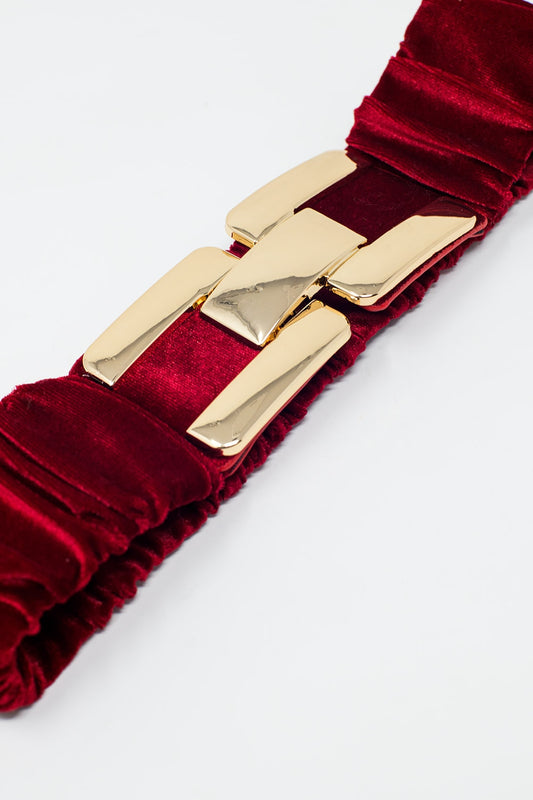 Cinturón burdeos de terciopelo elástico con cierre metálico