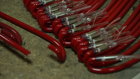 red-colored glas tubing