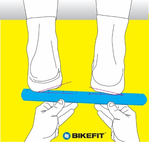 Digital illustration of a bike fitter measuring the tilt on a cyclist's feet