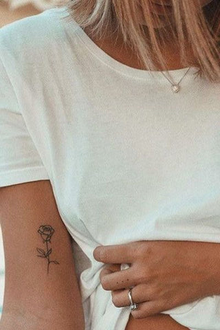 Rose tattoos on the arm
