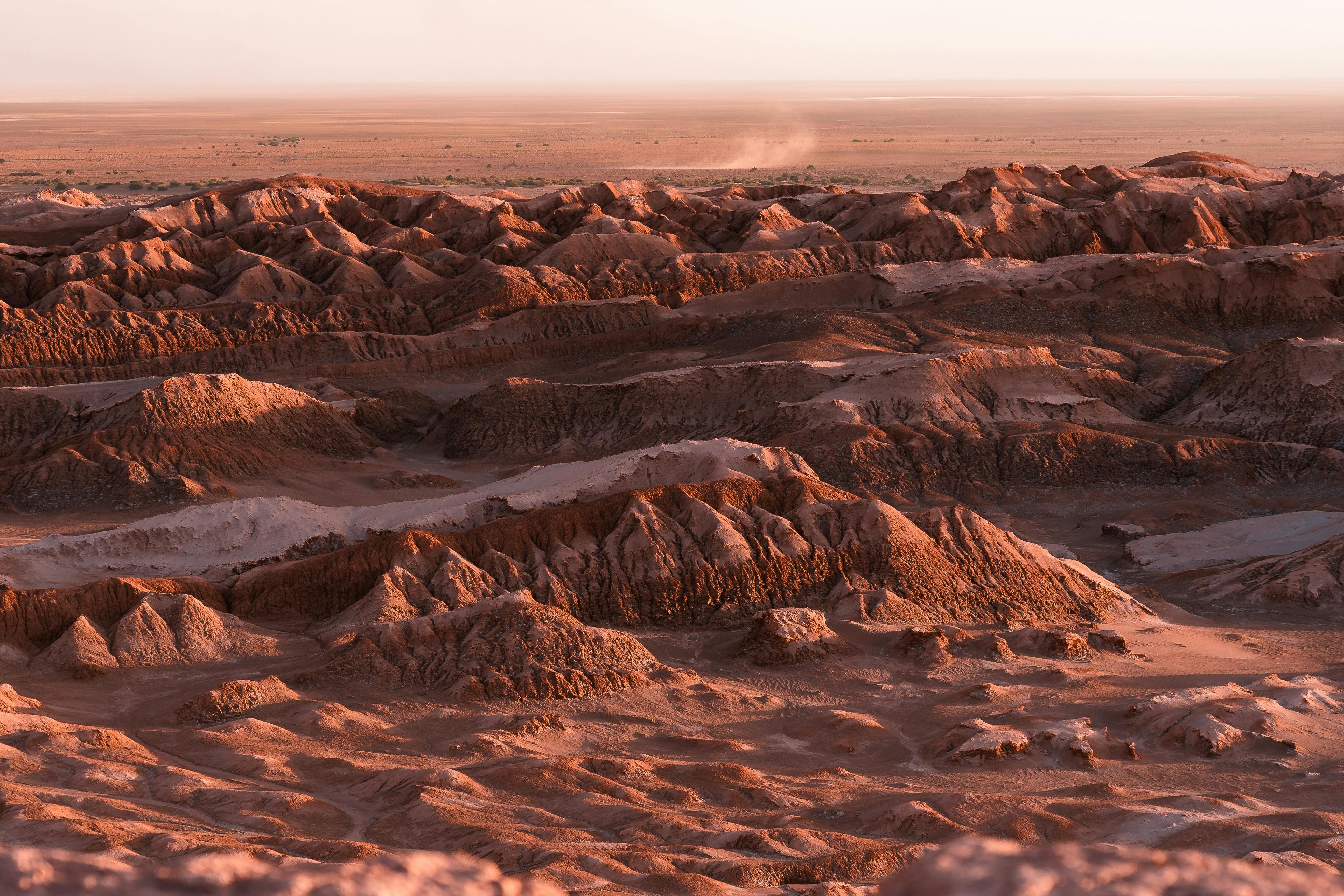 Breathtaking view of Chile's Atacama Desert where Permalution implements fog collector projects for ecosystem regeneration and climate adaptation in one of Earth's driest regions