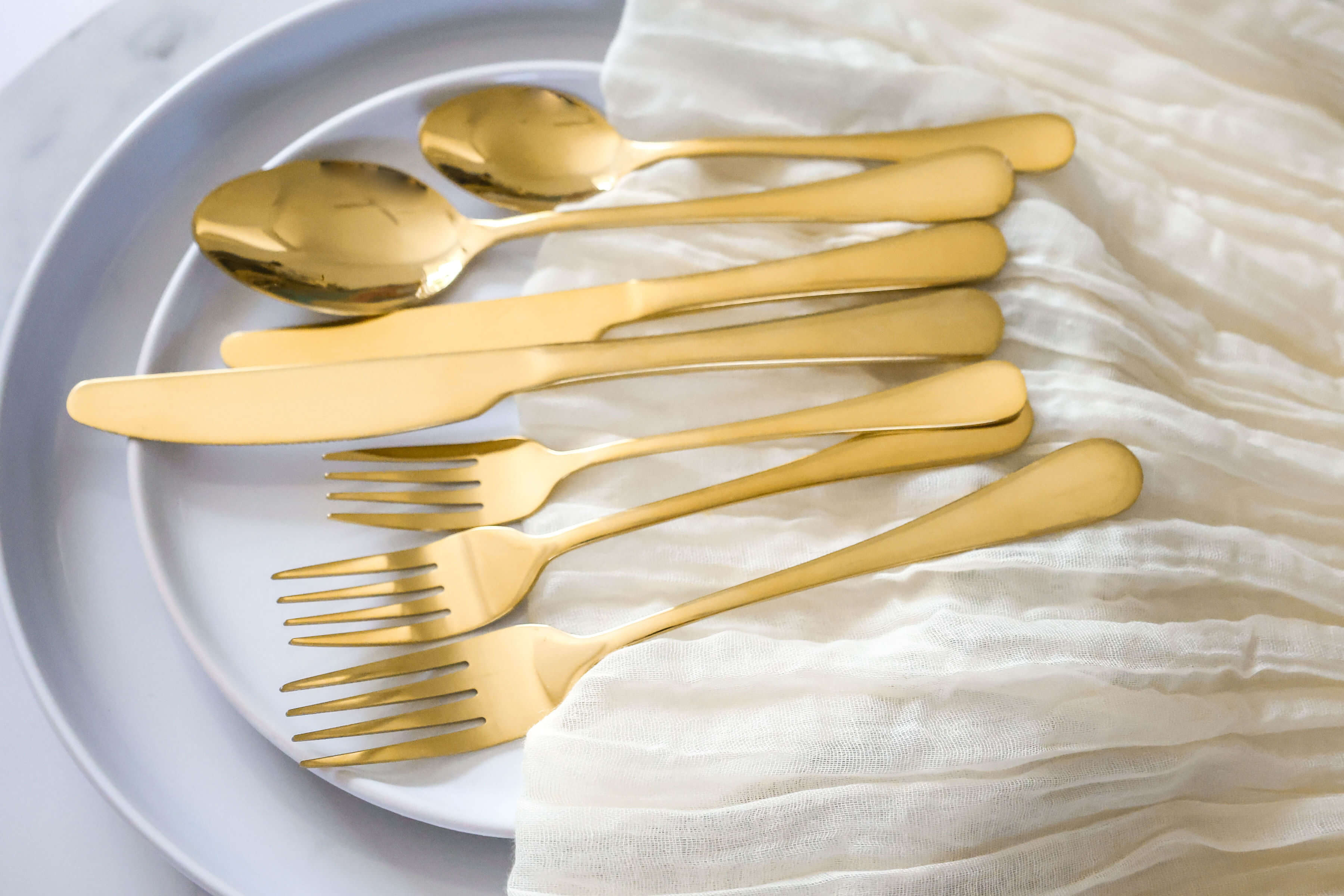 Complete set of gold plated flatware and cutlery