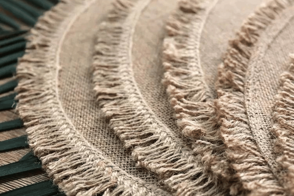 rattan fringed placemats stacked together