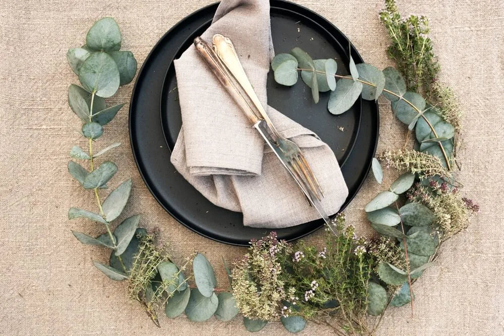 Tablescape featuring natural elements with sustainable plants as decorations