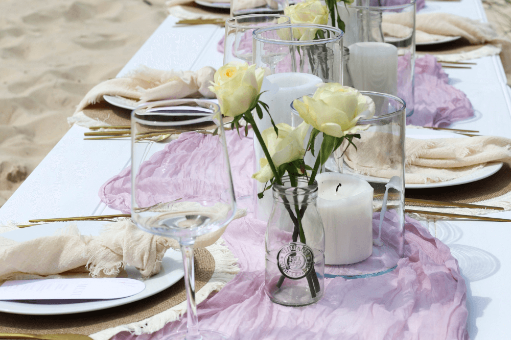 table setup by the beach using bohemian elements