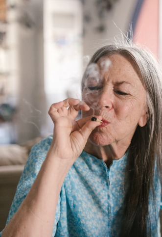 Aged woman smoking