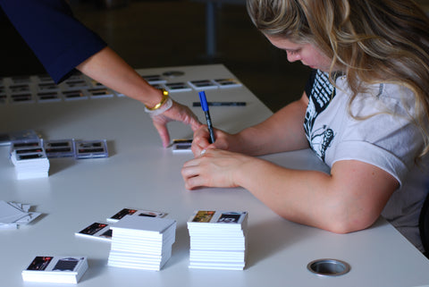 Kendall Reusing Autographs her Jiu-Jitsu Trading Card