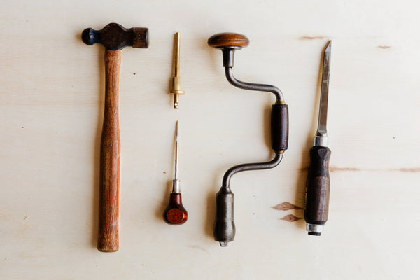 woodworking tools laid out on table