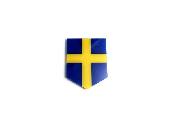 Radiator grille emblem with Sweden logo