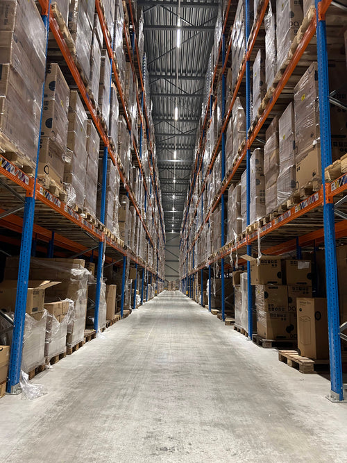 workers-with-hardhats-reflective-jackets-walking-through-big-warehouse-aisle-checking-goods-condition_342744-1450__PID:2fe057cb-03cb-4b25-85c9-56d55f0d2bf0