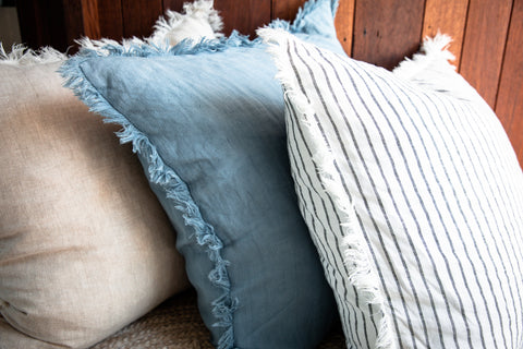 European Flax Linen Cushions from Lurline Co. with fringe in natural, blue and stripe
