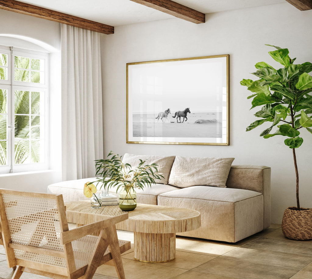 Wild Horses on the beach framed in a modern interior