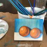 painting of oranges on a blue and white background