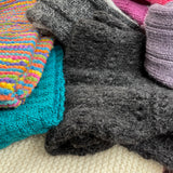 handknit scarves in multiple colors