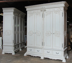 Carved armoire with 4 doors and 4 drawers