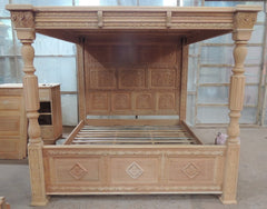 carved four poster bed