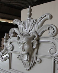demon devil bed carved face head