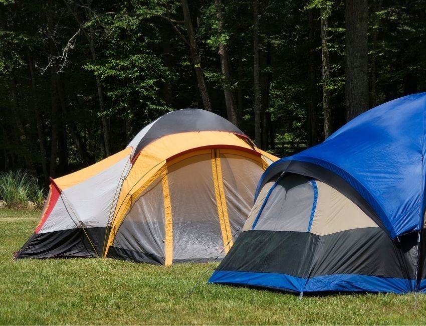 yellow and blue family tent next to each other