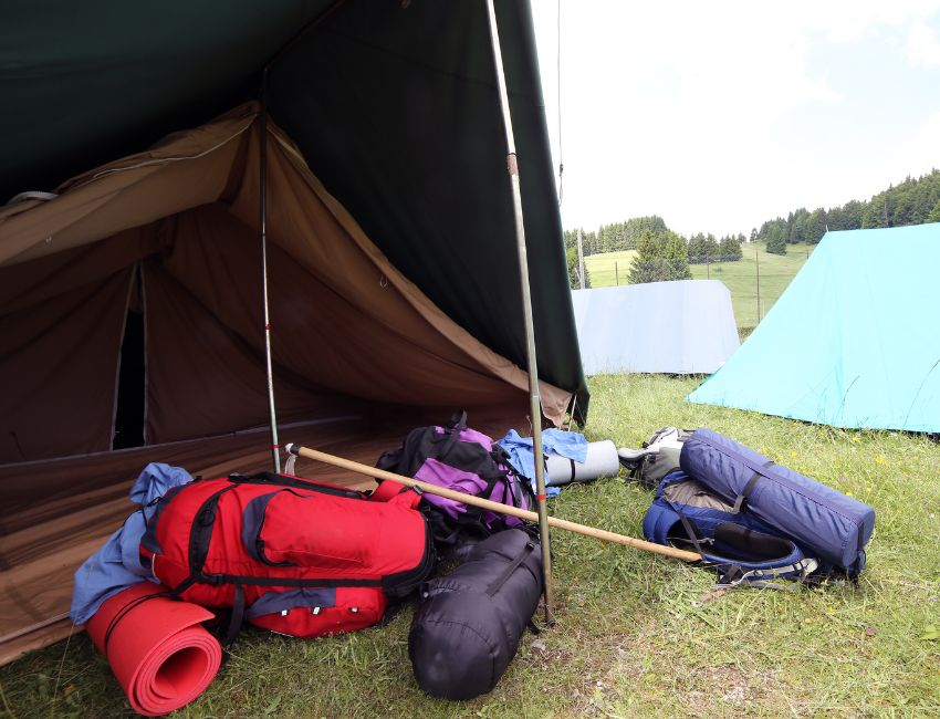 Sleeping bags sitting under the tent