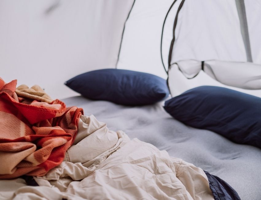 cozy tent with pillow and bed