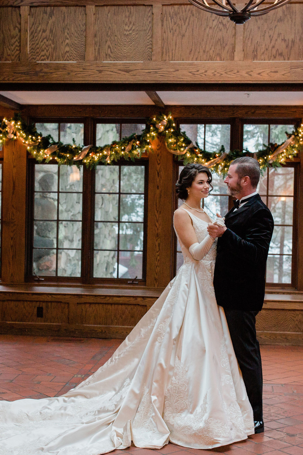 bride and groom dancing in conservatory at Willowdale Estate New England