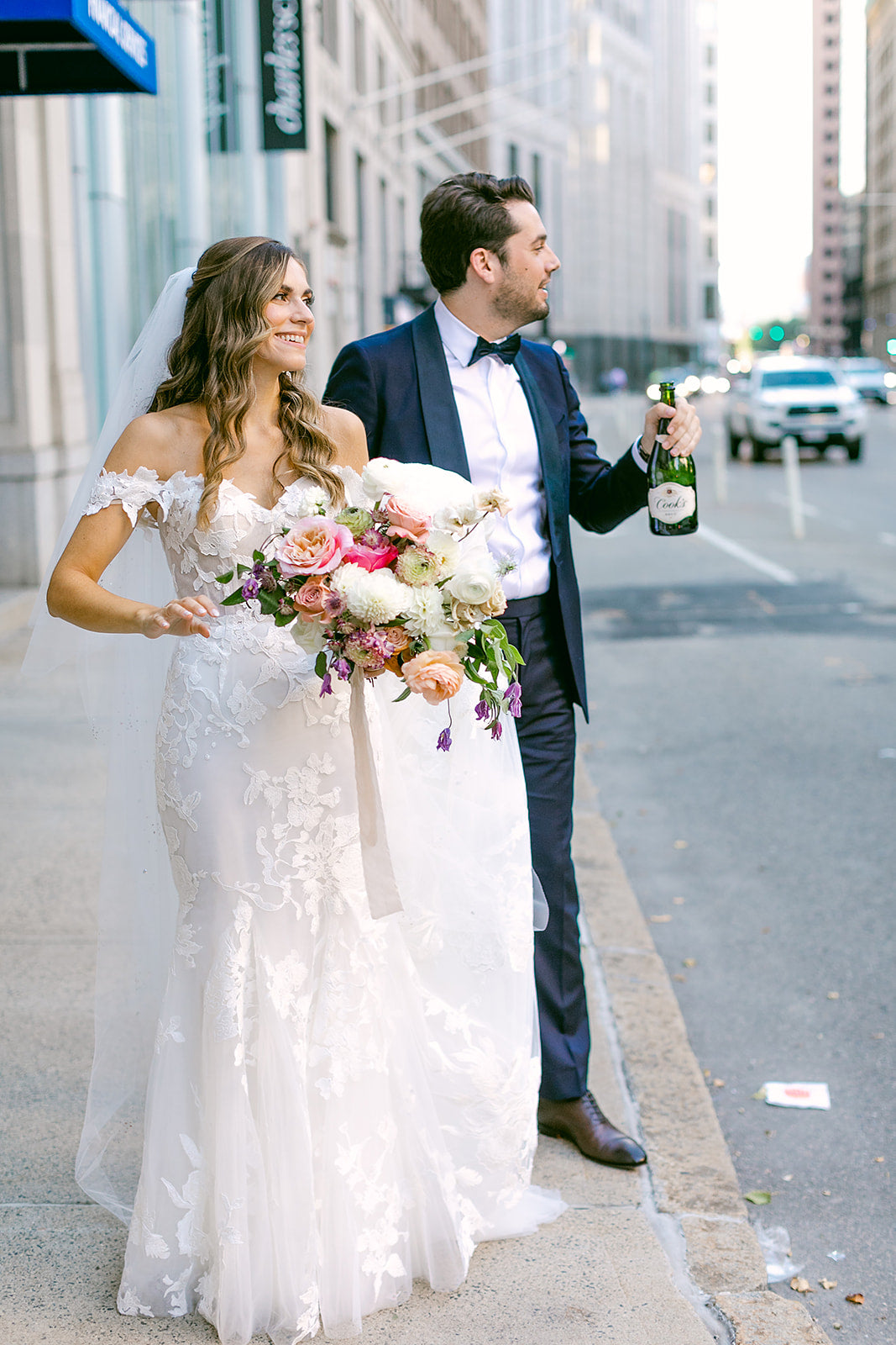 bride and groom walking around boston massachusetts
