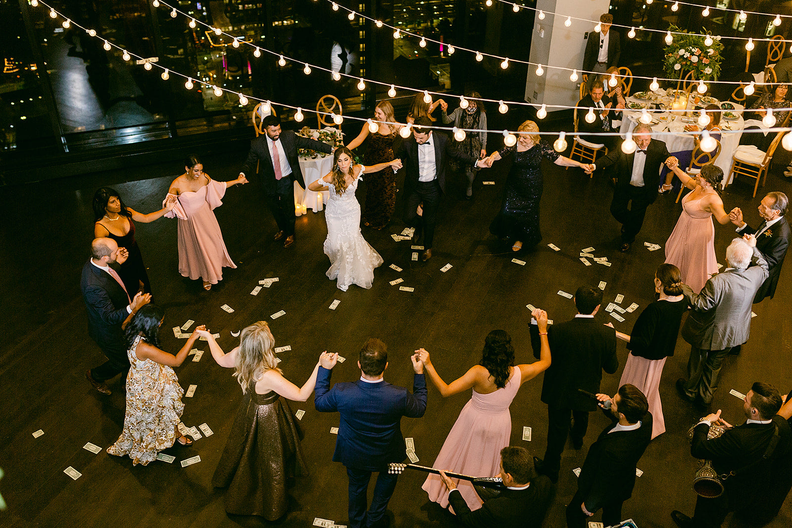 sirtaki greek traditional dance performed in dance floor at wedding reception in boston