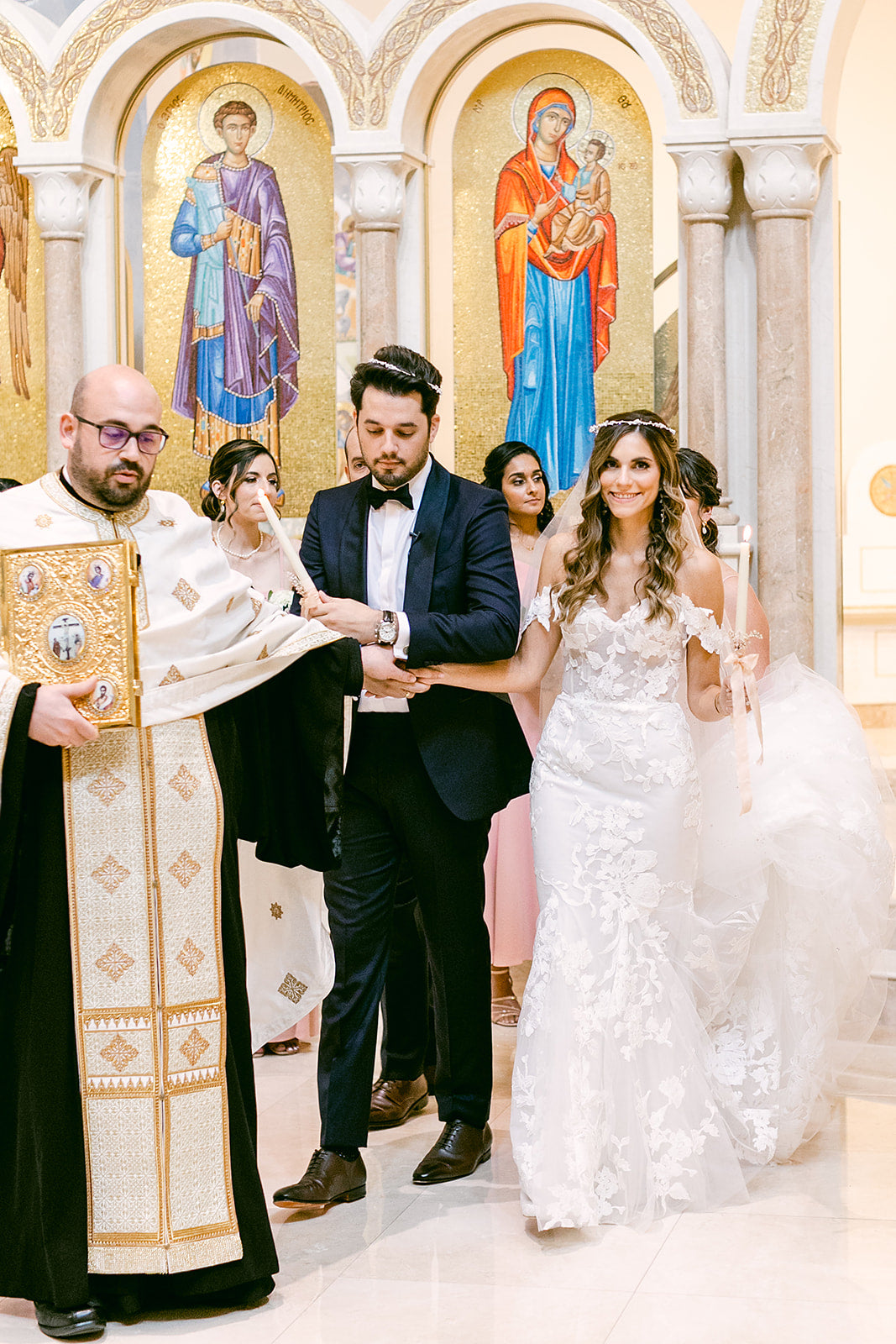 bride and groom exchanging vows at greek wedding weston ma