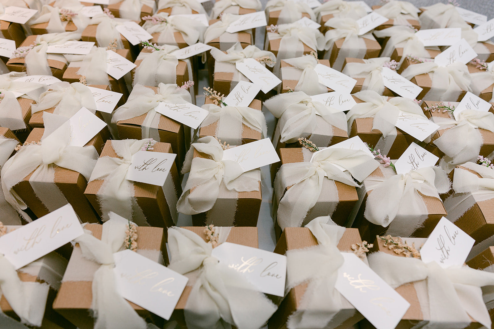 favor boxes filled with jordan almonds for the guests