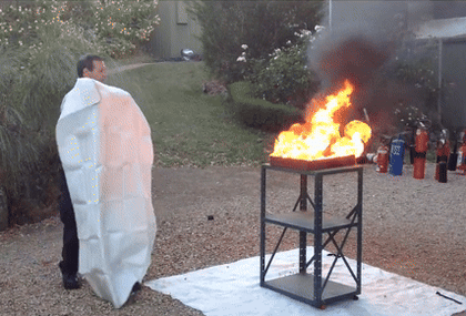 Fire_Blanket_Demo (3) (1).gif__PID:48afb477-c2d6-49d3-860c-66186dee654a