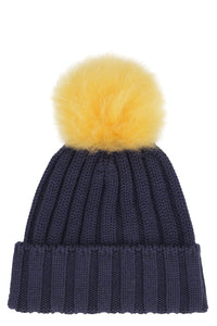 Knitted wool hat with pom-pom