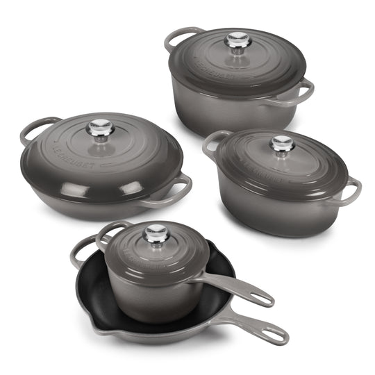 https://cdn.shopify.com/s/files/1/0614/2158/4638/products/LeCreusetSignatureCastIron9PieceOysterCastIronCookwareSet_540x.jpg?v=1655143852