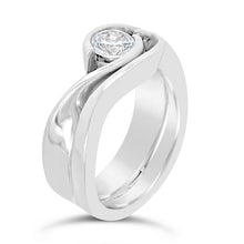 diamond twist engagement ring