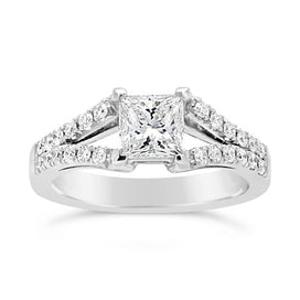 Pave set engagement ring with princess cut diamond in platinum