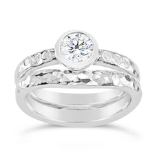 Hammered engagement ring with round diamond handmade in platinum
