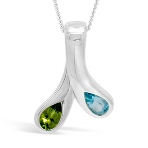 peridot pendant with blue topaz in silver, moi et toi design