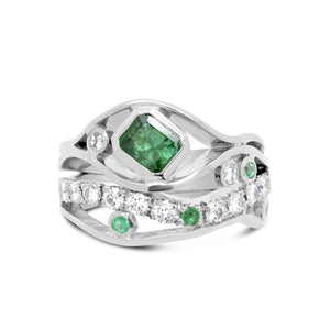 Platinum emerald and diamond wave ring