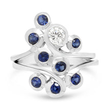 sapphire ring, stacking swirl design with diamonds in platinum