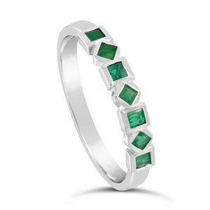 Unusual emerald eternity ring