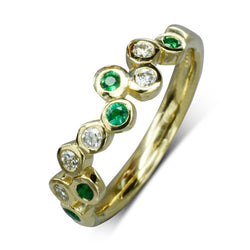 Unusual Gold Eternity Rings with emeralds and diamonds