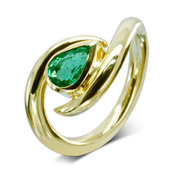 gold emerald ring with pear shaped emerald