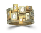Bespoke stacking rings in white and yellow gold with emerald cut diamonds