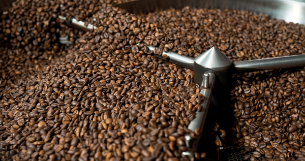 Coffee beans being roasted in a coffee roasting machine