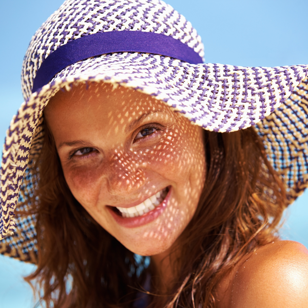 woman wearing a sun hat