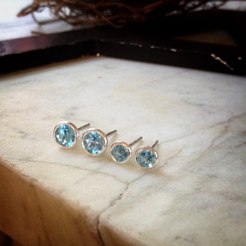 Paraiba blue topaz bezel set martini stud earrings