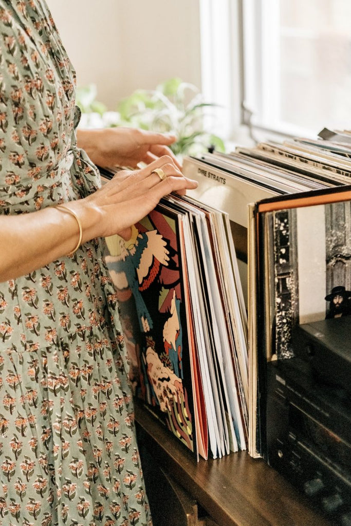 hands sifting through records