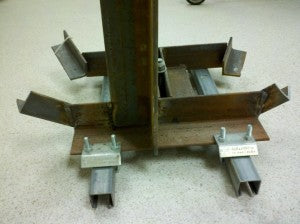 fabricated red iron supports and strut