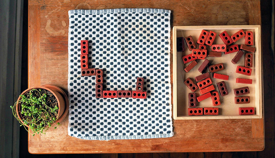 Image of an at home learning prompt using an arrangement of Guidecraft Little Bricks